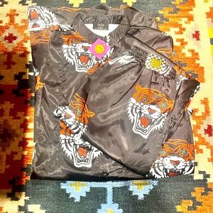 Brand new playsuits x 2. Both are size small/medium.